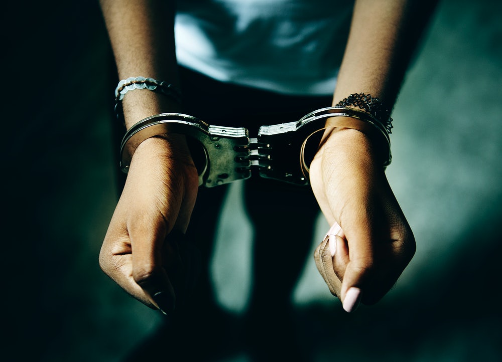 handcuffed person image