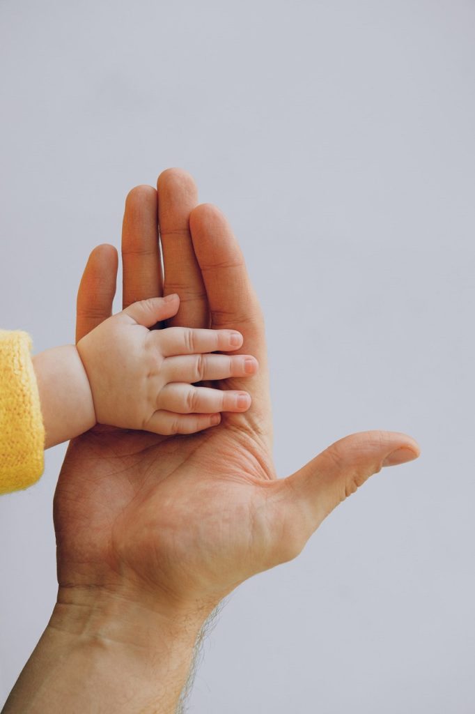 father and child hand