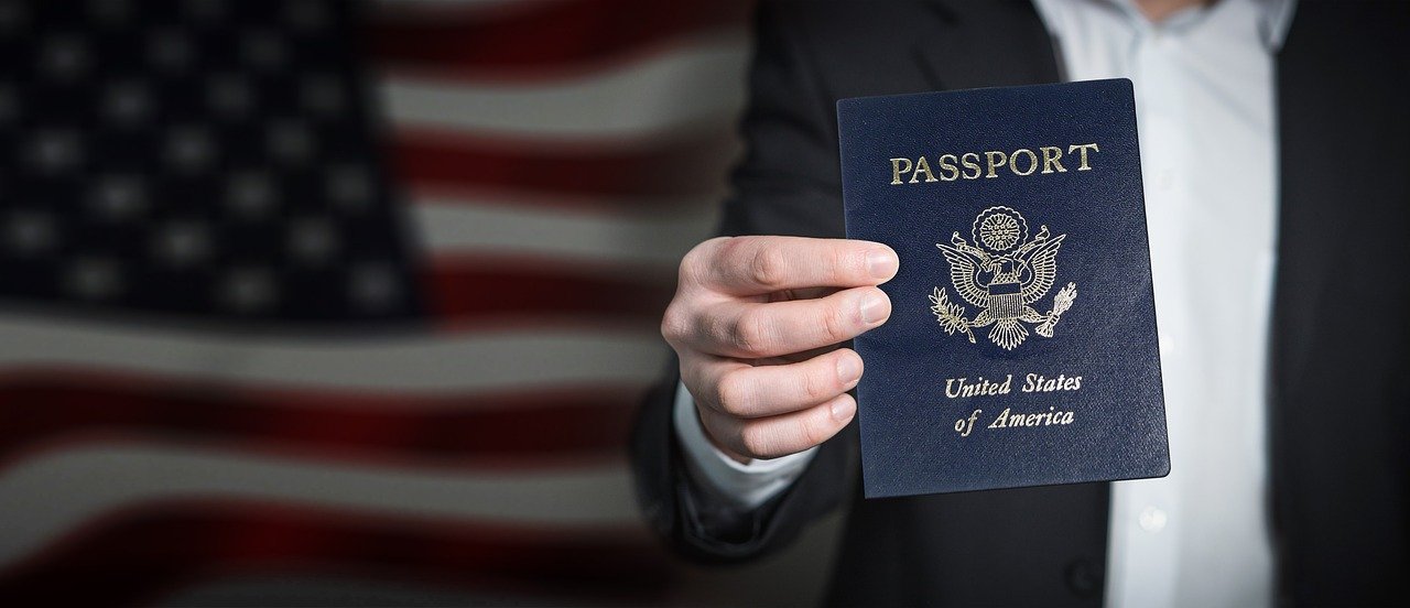 man showing united states of america passport