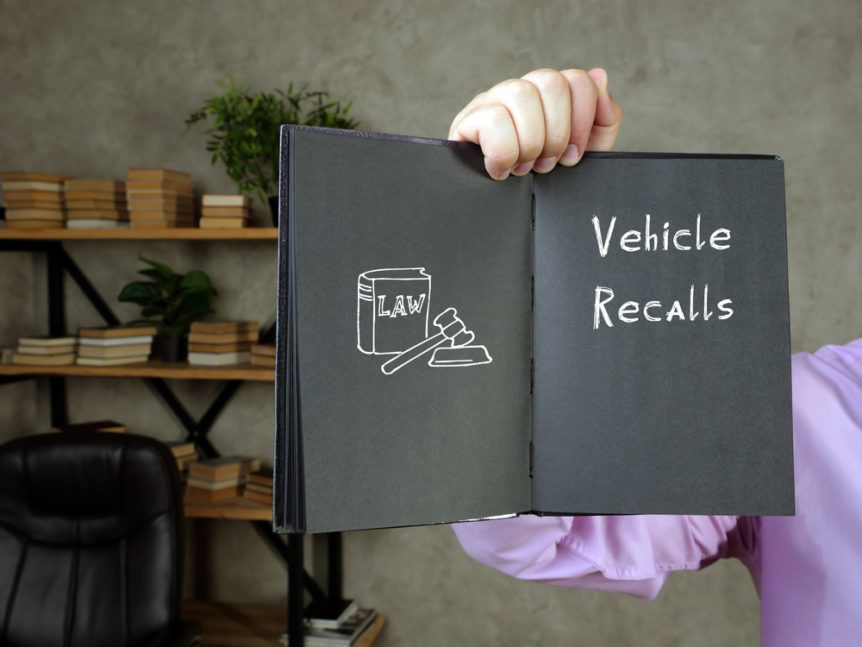 Vehicle Recall with sign on the piece of paper
