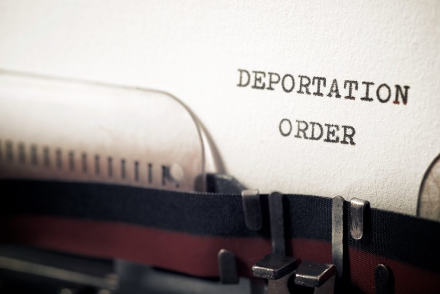 Deportation order phrase written with a typewriter