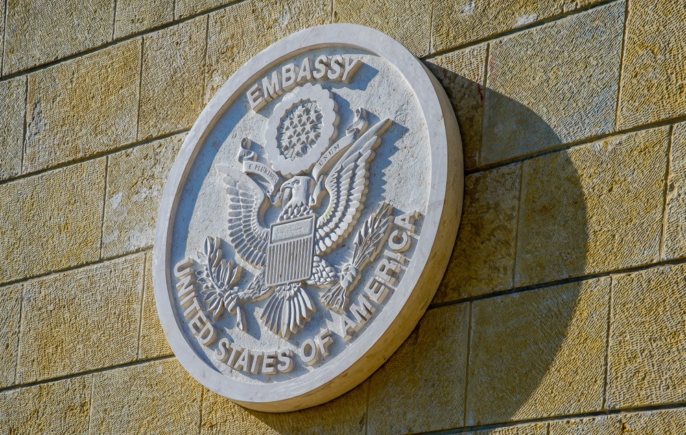 embassy seal on the stone wall