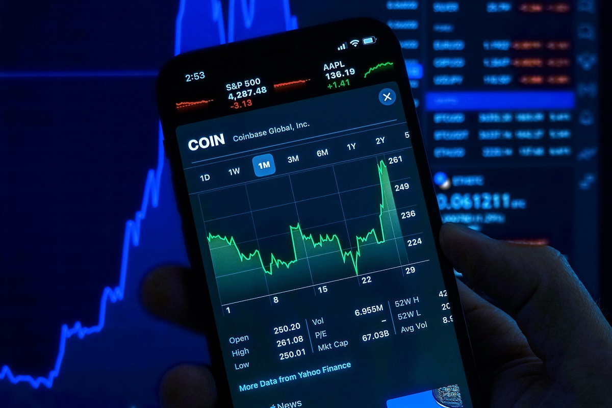 close up of person using coinbase app on smartphone